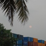 moonrise over container yard yangon